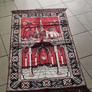 Rug colorful red . Maybe  Turkish? Excellent condition no stains No tags 43"